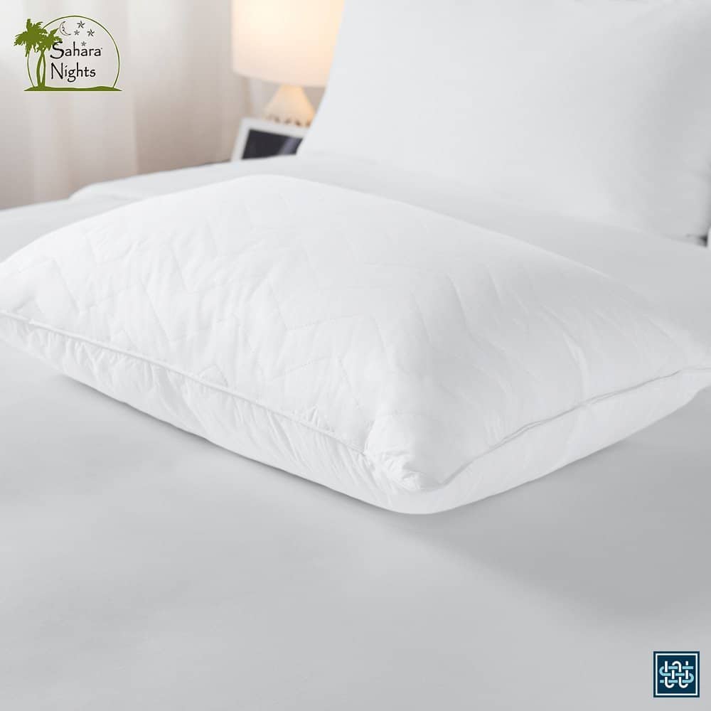 Sahara Nights cotton gel filled luxury hotel pillow by Sobel Westex on hotel bed with white linens