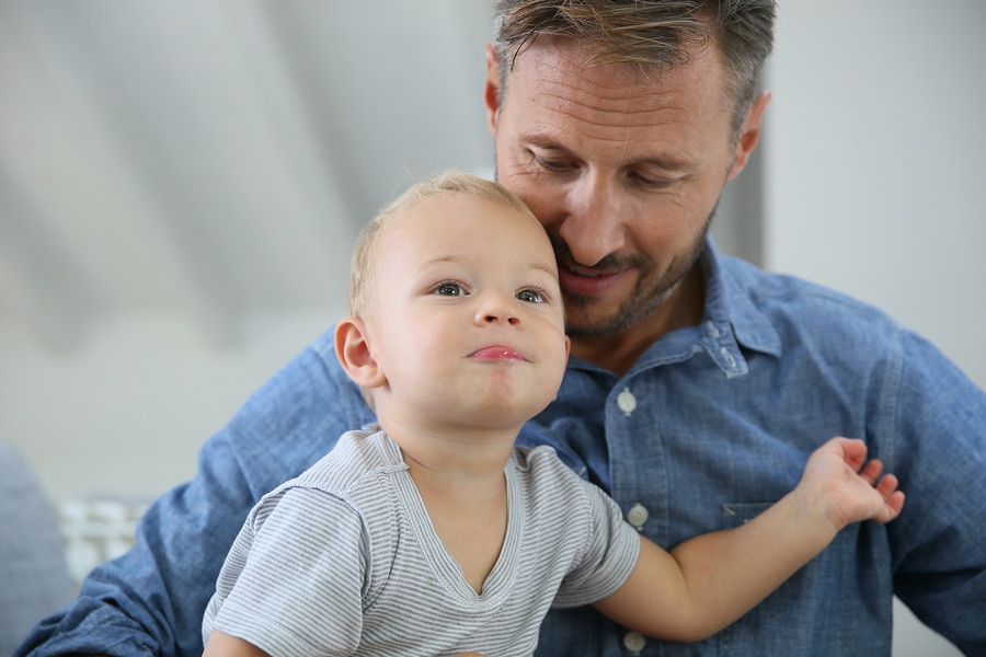 Dad and baby boy at home