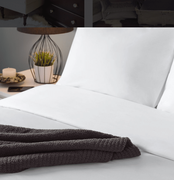 Brown Sobel Westex chenille blanket across a neatly made luxury hotel bed