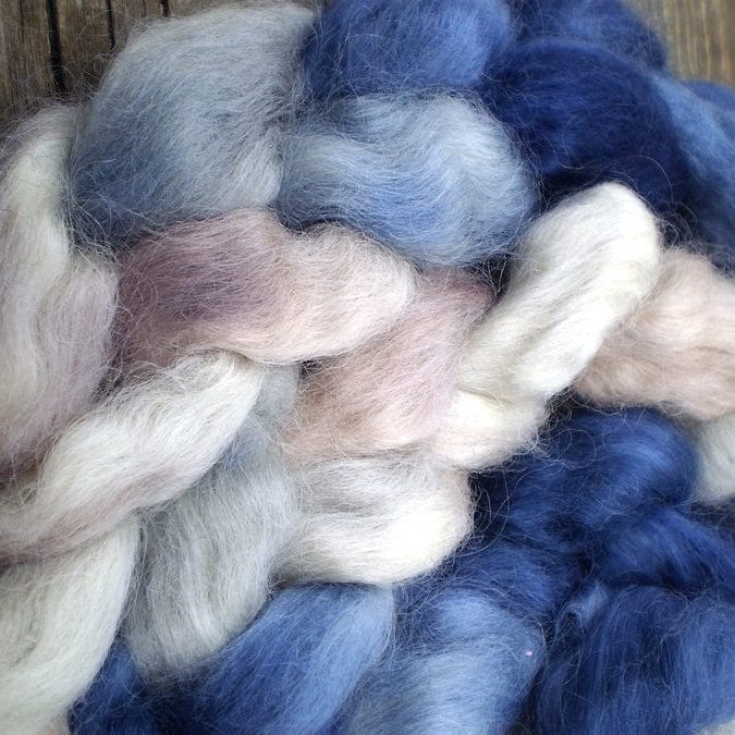 Alpaca wool blue and white wool on a wooden board