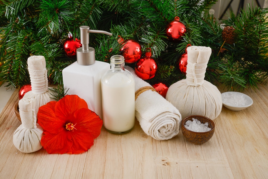 spa style lotions, bath oils and towel christmas display for guest bathroom