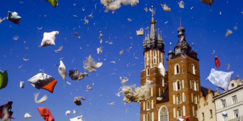 Flying pillow feathers and down during international pillow fight day