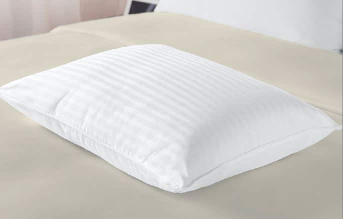 Sobel Westex dolce notte II bed pillow on clean gray blanket