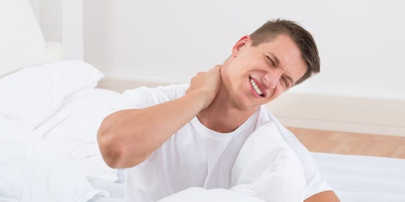 Man Sleeping with Pillow between Legs Stock Photo - Image of