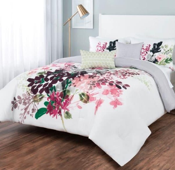 Sobel floral comforter set white with Euro style flower print displayed on a bed in a bright bedroom