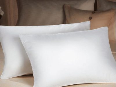 two sobel dolce vita eco pillows on bed thick and lofty
