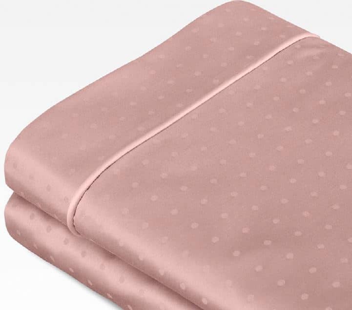 Swiss dot jacquard rose color bed set by Sobel Westex folded