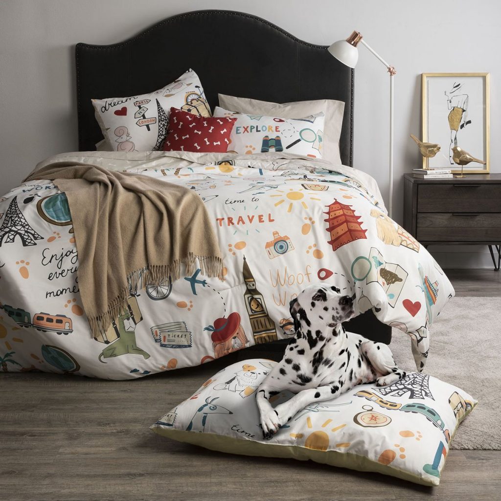 Travel themed comforter set by Sobel Westex with throw pillow and matching dog bed