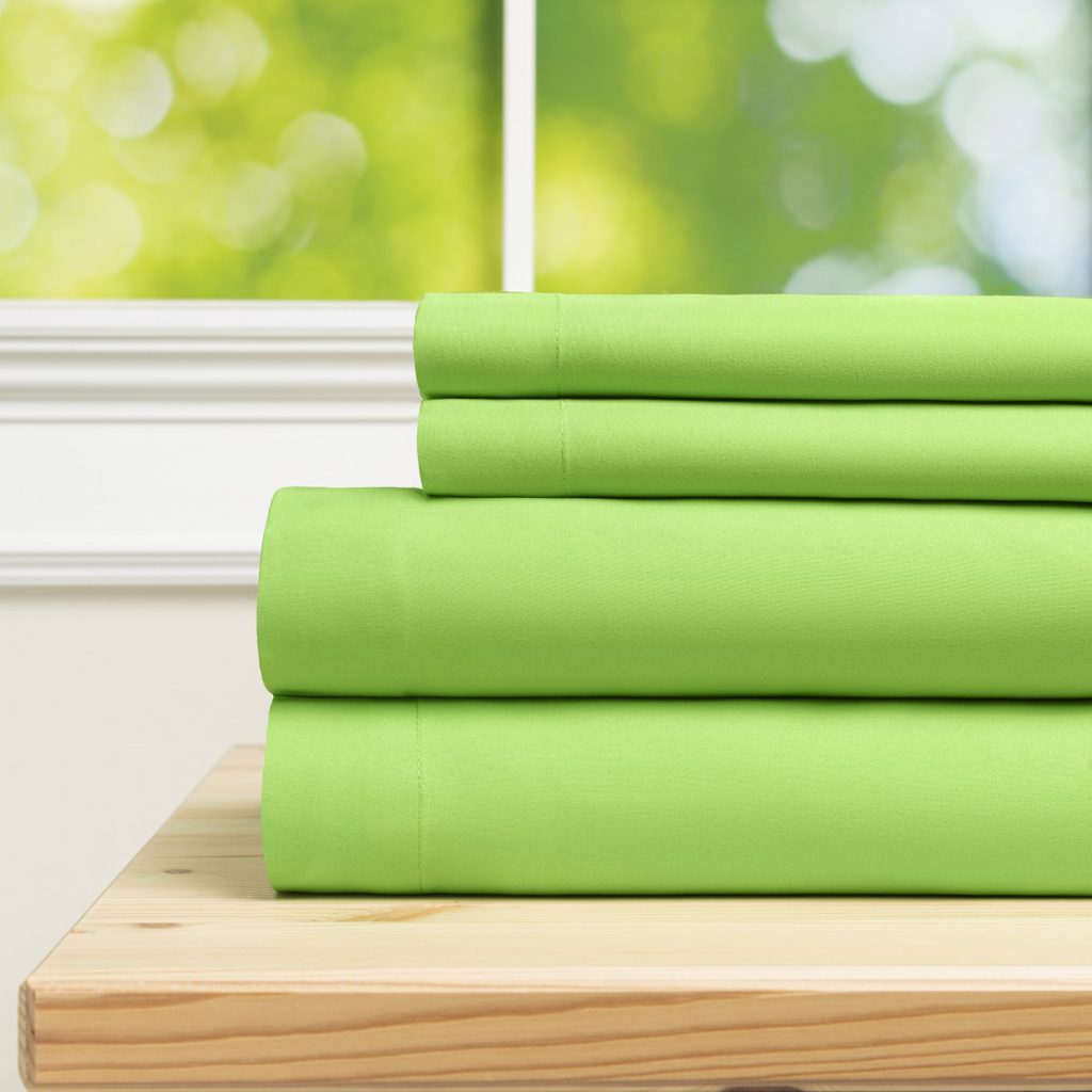 Spring green pyramid percale sheets stacked sheet set