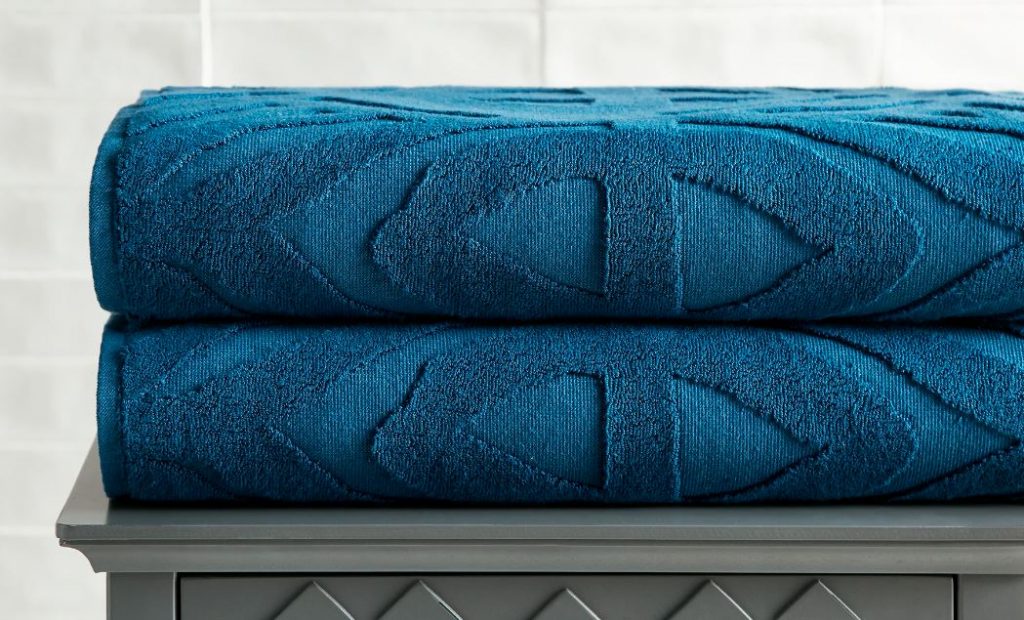 Sobel Westex Star Wars™ themed bath towels with Jedi™ Aurebesh pattern azure blue two bath towel set