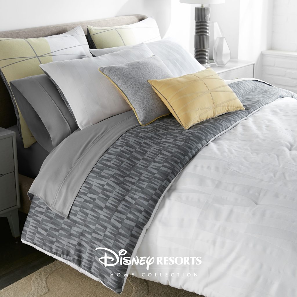 Disney Contemporary Resort bedding set in whites, grays and golds from the Disney Resorts Home Collection from Sobel Westex