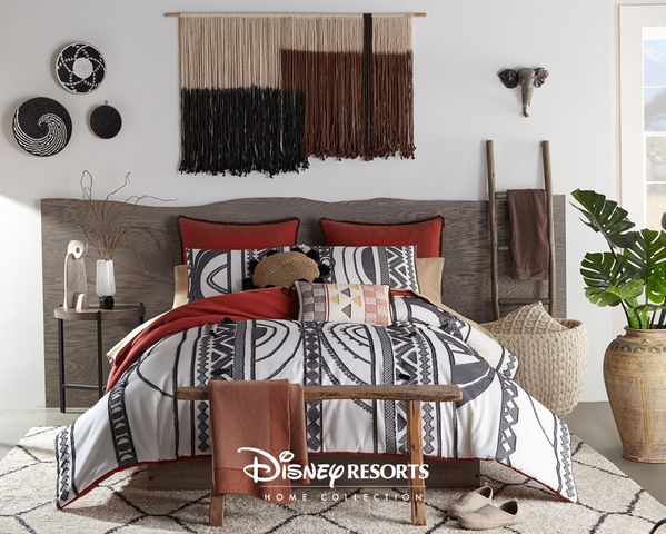 Disney Resorts Home African jungle design bedding set on display comforter shams and four decorative pillows