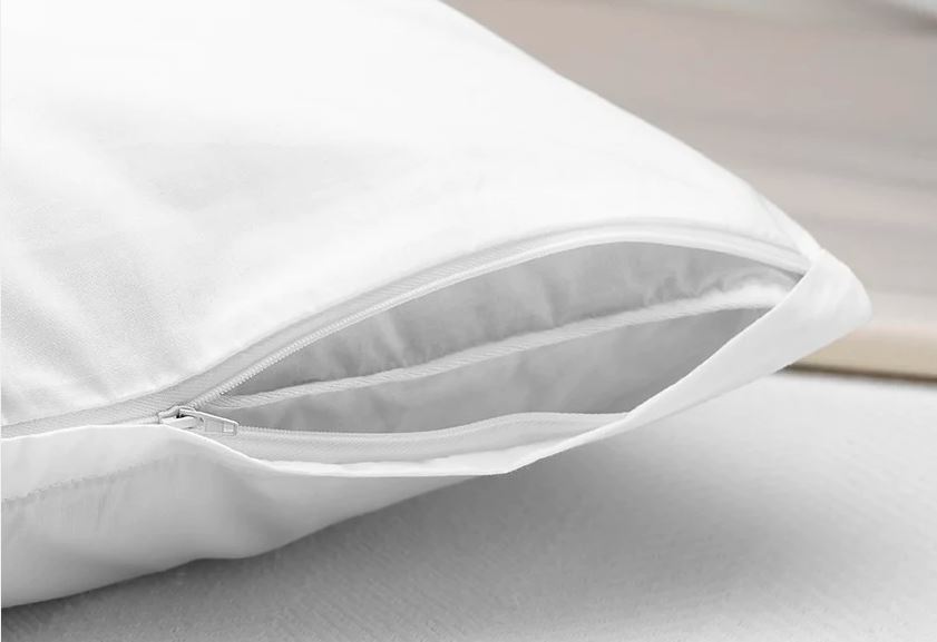 Pillow protector zips over and protects your quality pillow from dust, mites, odors, and allergens.