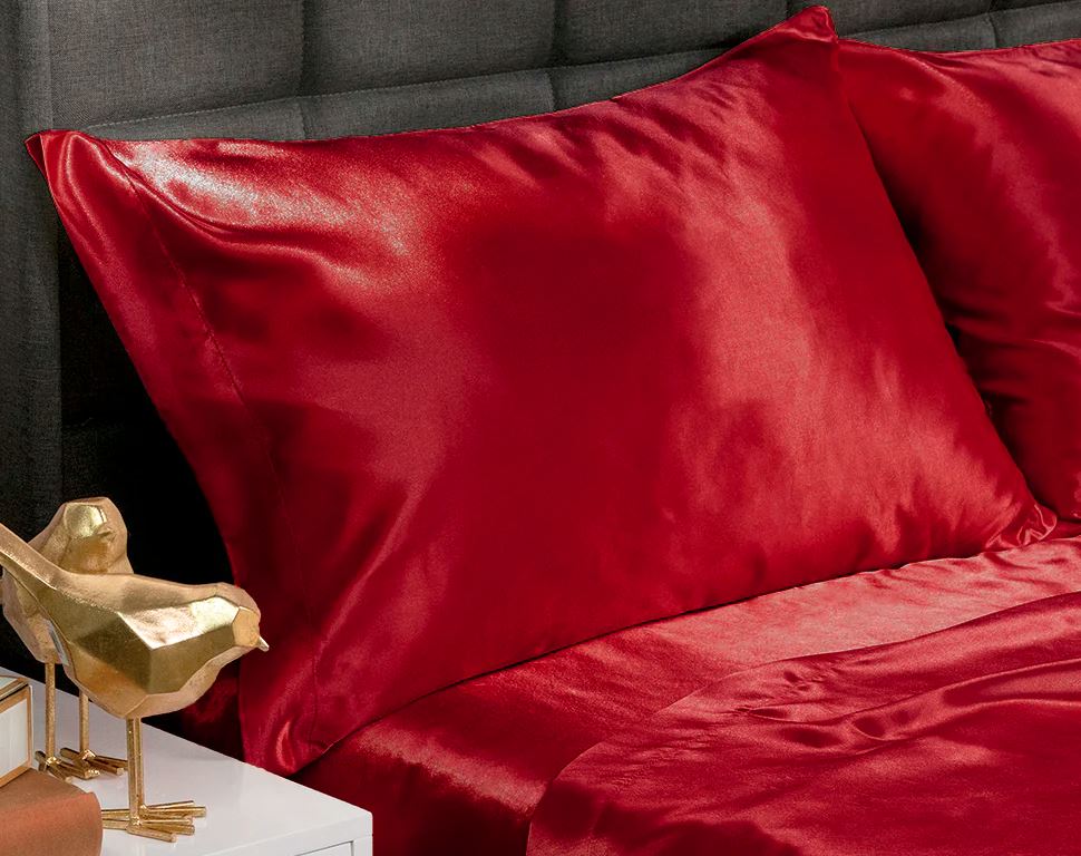 pillows and matching smooth satin bed set in red