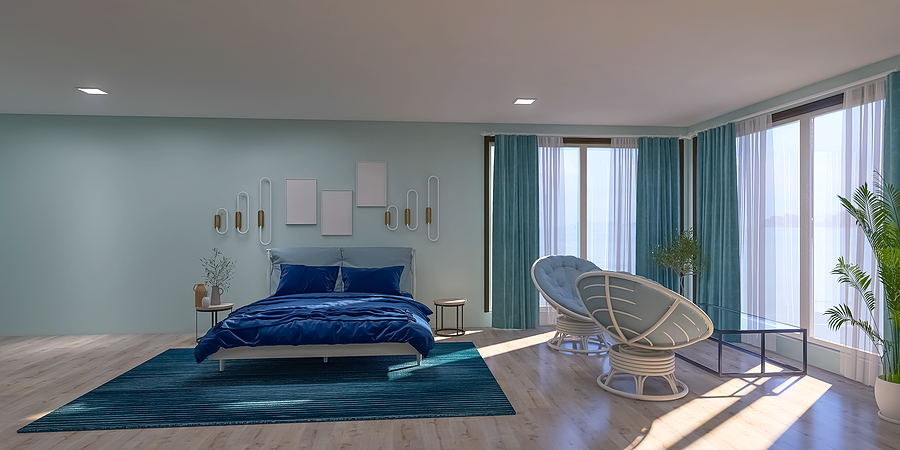 a well balanced bedroom complete with hotel quality bedding in cool colors